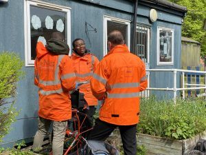 People in Hi-vis talking about an audit